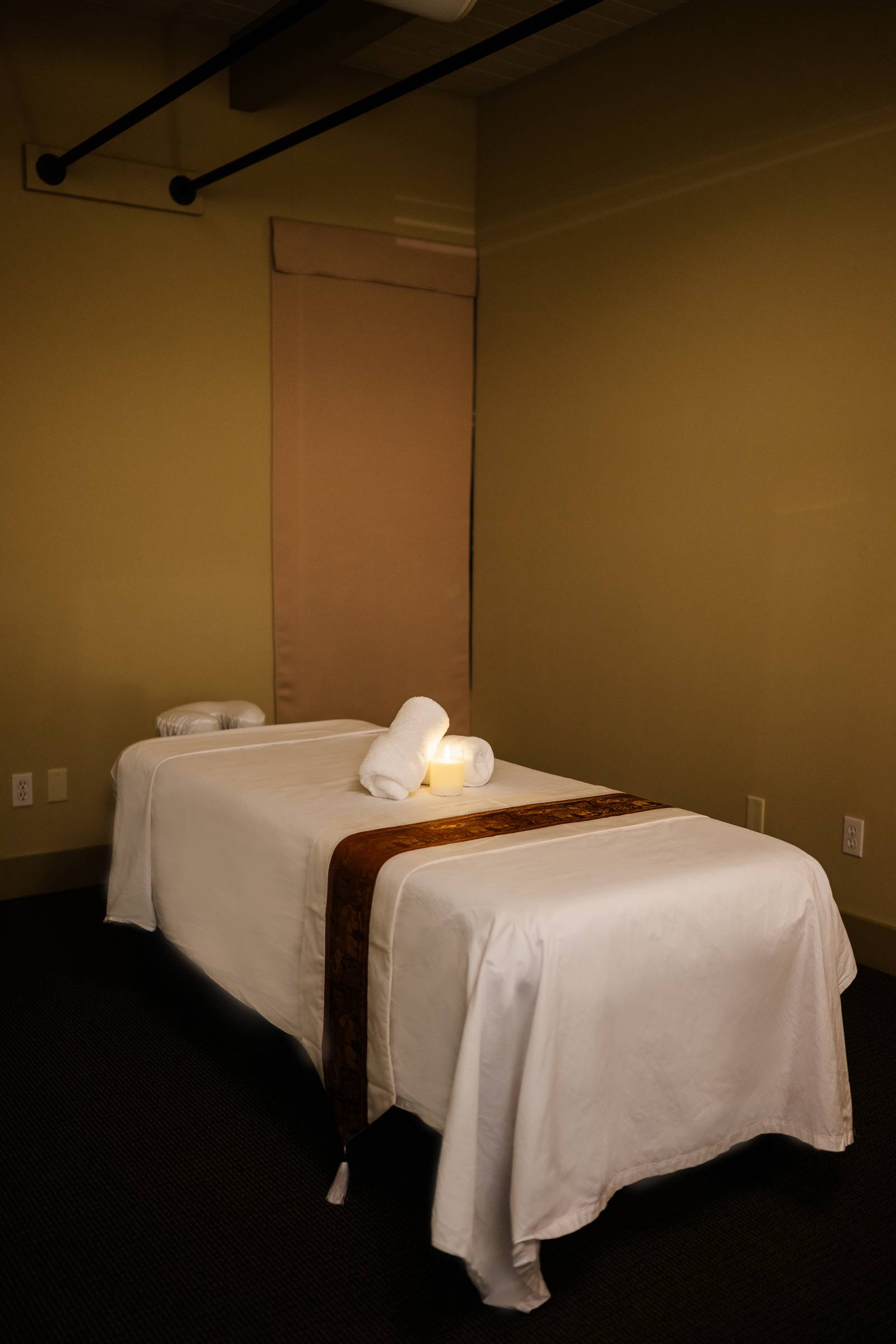 Private single massage room with professional massage table